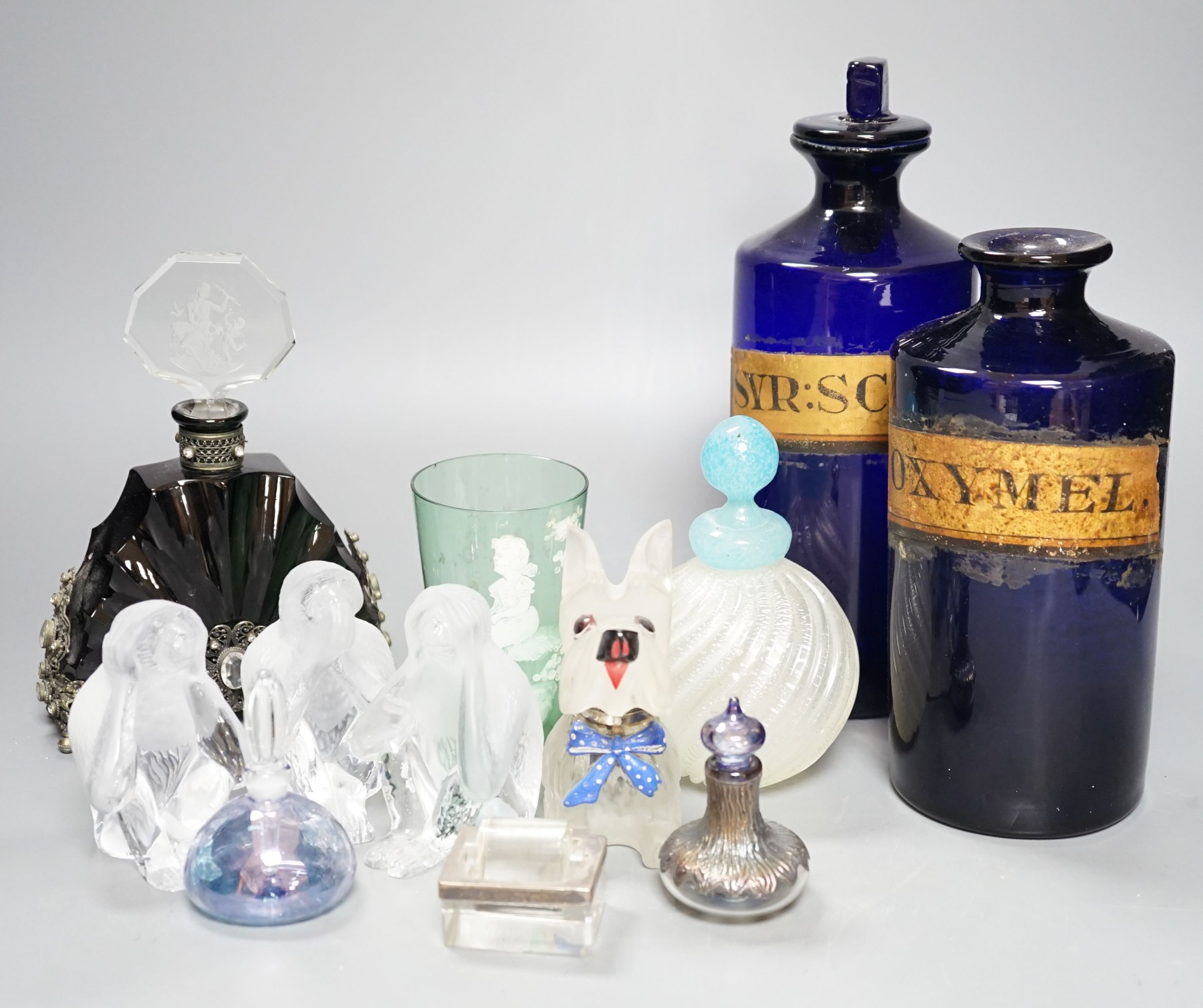 A pair of blue glass drug jars and a novelty glass dog inkwell etc, tallest 24 cms high